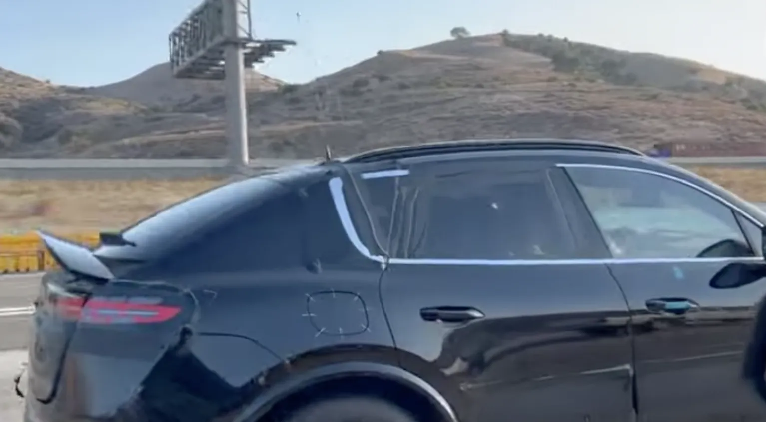 2024 Porsche Macan EV side photo